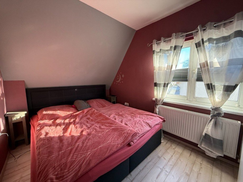 Schlafzimmer im OG Reihenendhaus Anklam